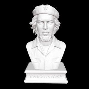 May include: White bust sculpture of Che Guevara wearing a beret with a star on it. The bust is on a base with the words "CHE GUEVARA" inscribed on it.