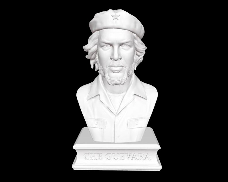 May include: White bust sculpture of Che Guevara wearing a beret with a star on it. The bust is on a base with the words "CHE GUEVARA" inscribed on it.