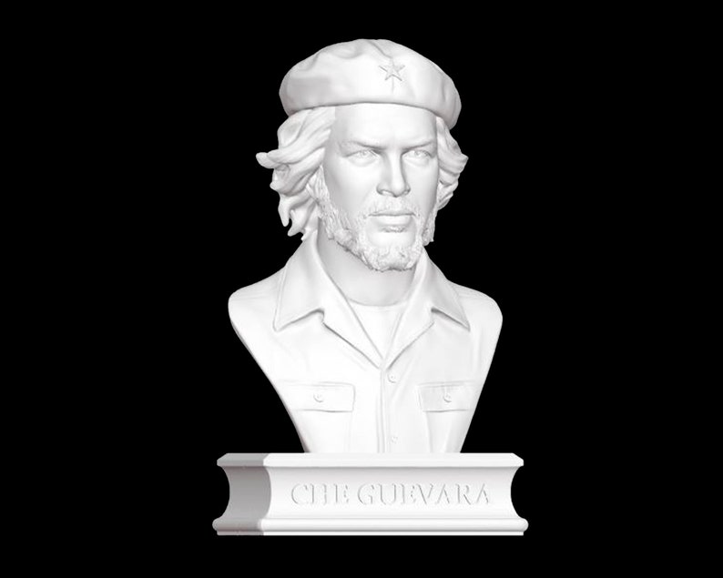May include: White bust sculpture of Che Guevara wearing a beret with a star on it. The bust is on a white base with the name "CHE GUEVARA" inscribed on it.