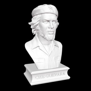 May include: White bust sculpture of Che Guevara wearing a beret with a star on it. The bust is on a white base with the words "CHE GUEVARA" inscribed on it.