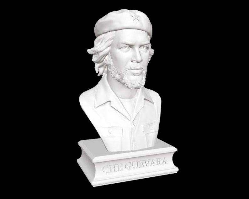 May include: White bust sculpture of Che Guevara wearing a beret with a star on it. The bust is on a white base with the words "CHE GUEVARA" inscribed on it.