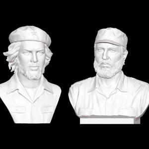 May include: Two white plaster busts of men with facial hair. The man on the left is wearing a beret with a star on it. The man on the right is wearing a cap.
