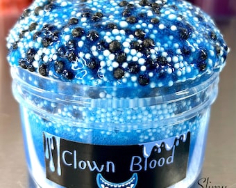 May include: A blue slime with black and white beads in a clear jar with a black label that says "Clown Blood" and a white label that says "Slimy Jester".