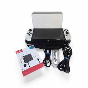 2022 Nintendo Switch OLED Ultimate Gaming Bundle (XTW) HEG-001 w/32Gb Sd Card, Joy-Cons, Dock, Headphones, Carrying Case & 4 Popular Games