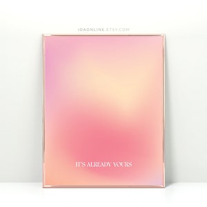 Könnte beinhalten: Ein rosa-orangener Farbverlaufshintergrund mit einem weißen Rahmen und dem Text "IT'S ALREADY YOURS" in weiß.