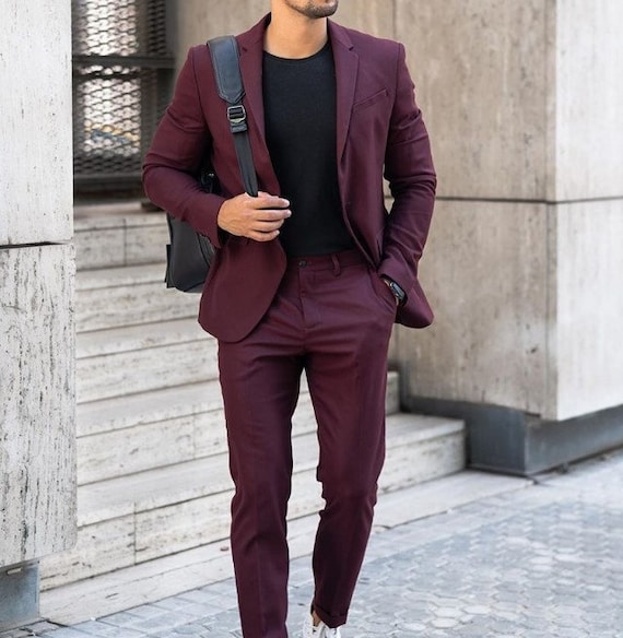 Always dress well but keep it simple @iwetramadhan wearing maroon suit by  @sasdesigns | Instagram