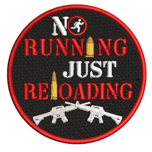 May include: A black and red circular patch with white embroidery. The patch says "No Running Just Reloading" with a no running sign, a bullet, and two rifles.