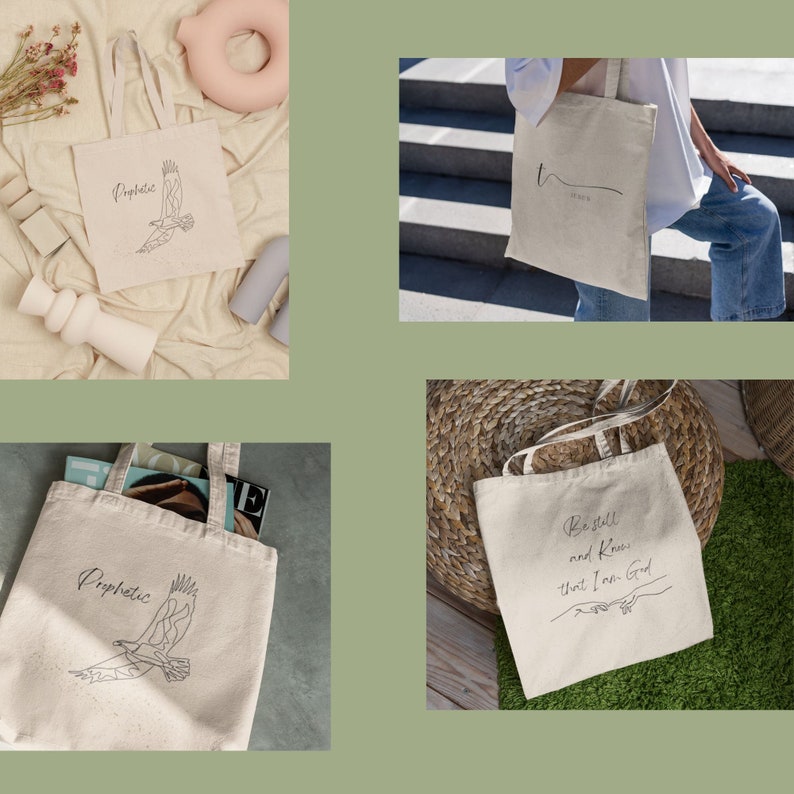 May include: Four tote bags with different designs. The first bag features a black and white line drawing of a bird with the word "Prophetic" above it. The second bag has the word "Trust" written in cursive. The third bag features a black and white line drawing of a bird with the word "Prophetic" above it. The fourth bag has the text "Be still and know that I am God" with a hand drawing of two hands reaching towards each other.