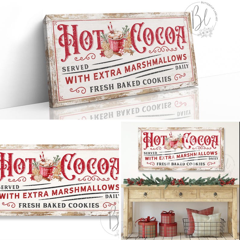 May include: A rustic wooden sign with white paint and red lettering that reads "Hot Cocoa Served With Extra Marshmallows Daily Fresh Baked Cookies". The sign is decorated with a red mug of hot cocoa, marshmallows, and candy canes.