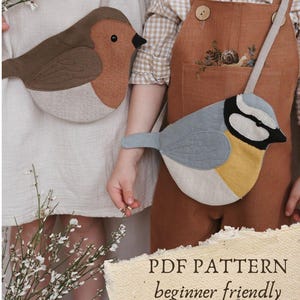 May include: Two bird-shaped crossbody bags. One is brown, tan, and beige, and the other is blue, yellow, and beige. The bags are worn by children. The text "PDF PATTERN beginner friendly" is at the bottom of the image.