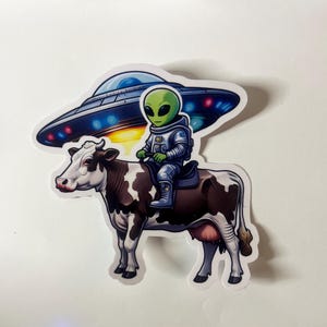 Alien sticker/cow/UFO Click to explore size options laminated/weatherproof/water resistant.