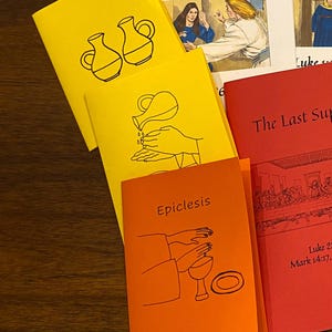 Può includere: Quattro libretti di carta colorati con disegni a tratto nero di scene religiose. I libretti sono intitolati "Annunciazione a Maria Madre di Dio", "Epiclesi", "L'Ultima Cena" e "El", con riferimenti biblici.