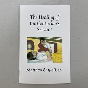 May include: A white booklet with the title "The Healing of the Centurion's Servant" and a picture of a man in a red robe healing a man lying on a bed. The text "Matthew 8: 5-10, 13" is printed at the bottom of the page.