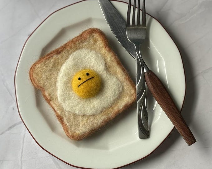Emotionless Egg Toast: Whimsical Breakfast Decor