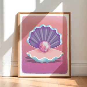 May include: A pink and purple seashell with a disco ball inside. The seashell is on a pink background.
