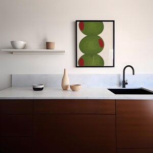 Hand drawn art print of three large olives off center to the left.