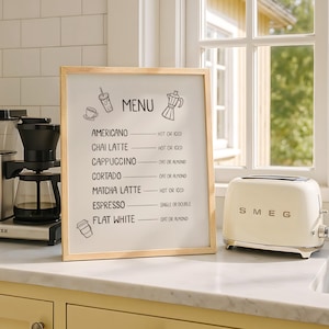 Art print of a drink menu. The list of drinks include; americano, chai latte, cappuccino, cortado, matcha latte, espresso, and flat white. The options next to each drink are; hot or iced, oat milk or almond milk, and single or double.