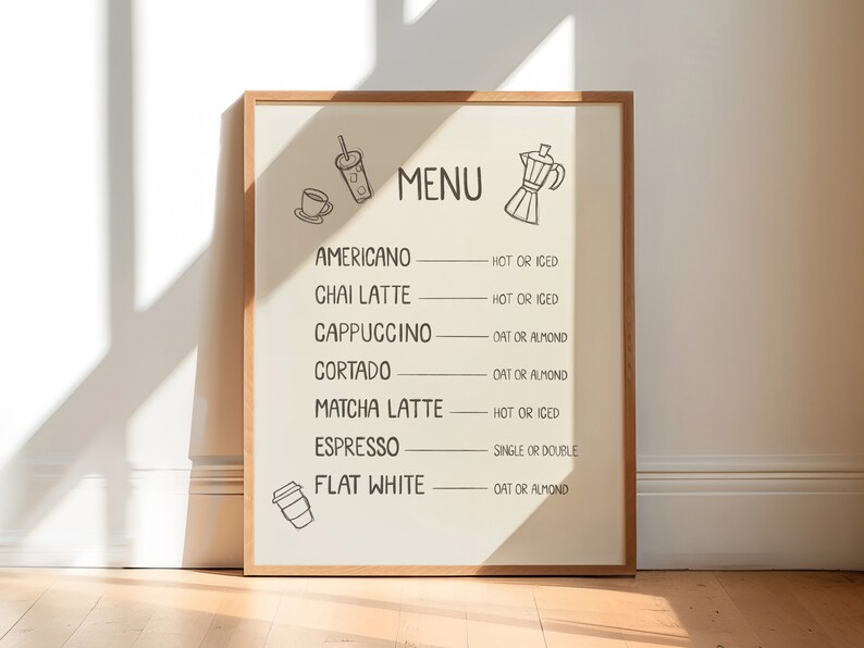 Art print of a drink menu. The list of drinks include; americano, chai latte, cappuccino, cortado, matcha latte, espresso, and flat white. The options next to each drink are; hot or iced, oat milk or almond milk, and single or double.