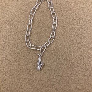 Saxophone love curb bracelet