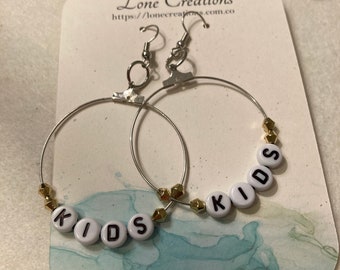 Silver “Kids” hoop earrings