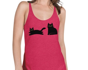 May include: A woman wearing a pink tank top with a black graphic of two cats. The cat on the left is lying down and the cat on the right is sitting up.