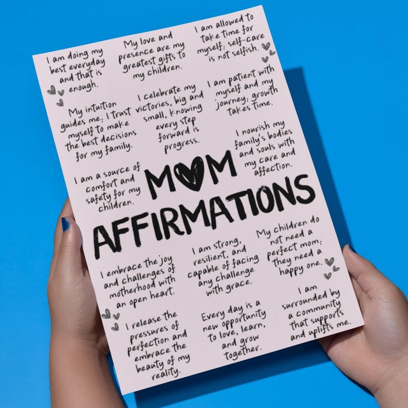 May include: Pink printable poster with the text "MOM AFFIRMATIONS" in black. The poster features a list of positive affirmations for mothers, including "I am doing my best everyday", "I am a source of comfort and safety for my children", and "I embrace the joy and challenges of motherhood".
