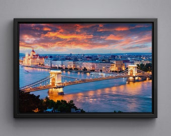 Evening view of Parliament and Chain Bridge in Pest City, Budapest. Colorful sunset art print on framed canvas, large size poster or acrylic