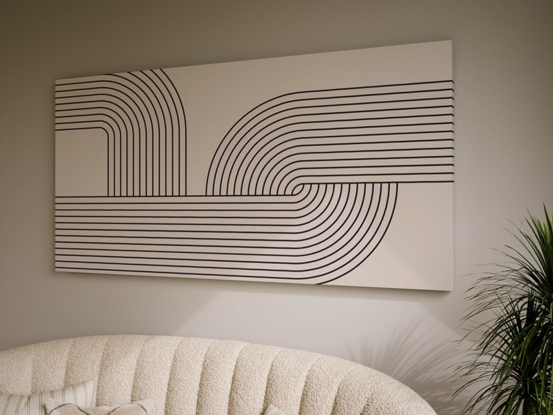 May include: Abstract wall art featuring a black and white geometric design of curved lines and stripes on a cream background.