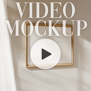 May include: A gold-framed picture with a white background and a play button icon in the center. The text "VIDEO MOCKUP" is superimposed on the image.