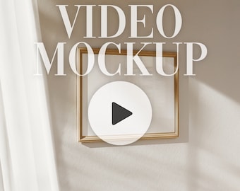 Peut inclure: Une image encadrée en or avec un fond blanc et une icône de lecture au centre. Le texte "VIDEO MOCKUP" est superposé sur l'image.