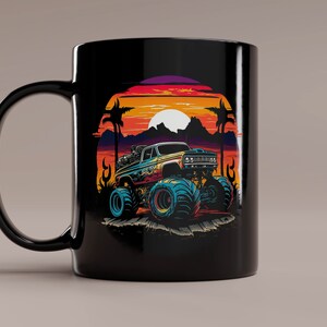 May include: Black ceramic mug with a colorful illustration of a monster truck driving through a sunset landscape with palm trees.