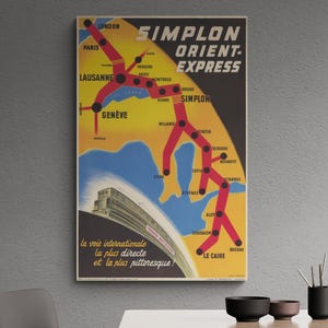 May include: A vintage travel poster for the Simplon Orient-Express featuring a map with red rail lines over a yellow and blue background. The text reads Simplon Orient-Express and la voie internationale la plus directe et la plus pittoresque.