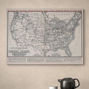 May include: Vintage map of the United States highways, showing paving and road distances. The map is in black and white, with the title "United States Highways" at the bottom. The map includes text at the top that reads "Key Map for Planning Transcontinental Tours - Paved Highways Shown in Solid Lines."
