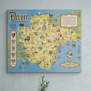 May include: A vintage map of Devon, England, with a blue background and colorful illustrations. The map shows the county's towns, cities, and landmarks, including the text "Devon, The Shire of Great Saxons".