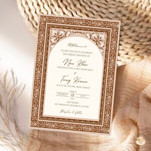 May include: A wedding invitation in beige and brown, featuring floral and archway designs. The invitation includes the names Noor Khan and Tariq Kareem, the date, time, and location of the ceremony.
