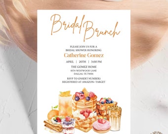 Puede incluir: Invitación a un brunch de novia con una ilustración de acuarela de un desayuno, que incluye waffles, panqueques, fruta y jugo de naranja. La invitación es para Catherine Gomez e incluye la fecha, la hora y la ubicación del evento. También se incluye información de RSVP.