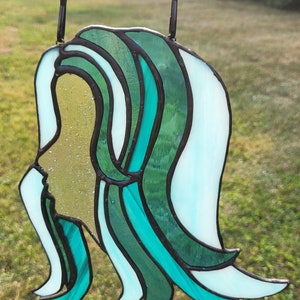 Woman Dreaming in Teal Stained Glass - whimsical and peaceful