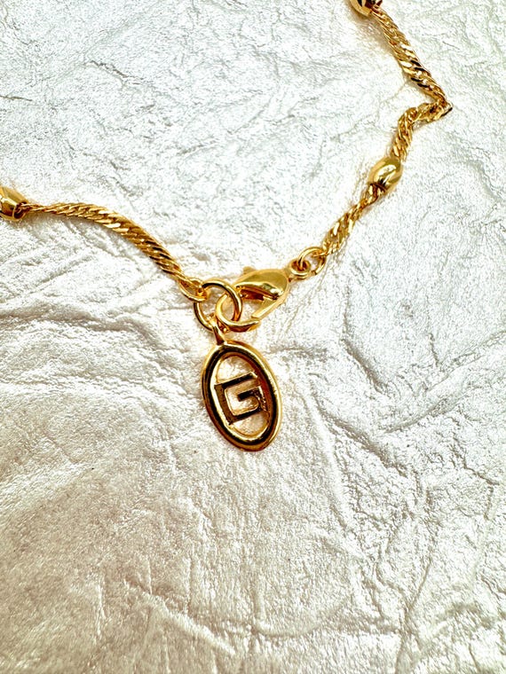 Vintage Signed GIVENCHY Gold Tone Bracelet: Twist Chain 1990s