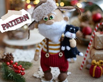 May include: Crocheted Christmas gnome toy wearing a brown and white hat, red pants, and a yellow and white striped shirt. The gnome is holding a black crocheted cat toy. The gnome is sitting on a burlap surface with a Christmas tree in the background.