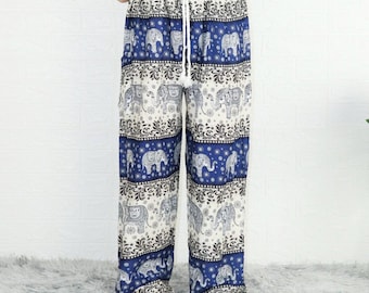 May include: Blue and white patterned pants with an elephant print. The pants have an elastic waistband and a drawstring.