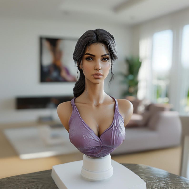 May include: A bust sculpture of a woman with dark hair and a lavender top. The sculpture is mounted on a white pedestal and set on a table. The background is a blurred interior scene with a painting and furniture.