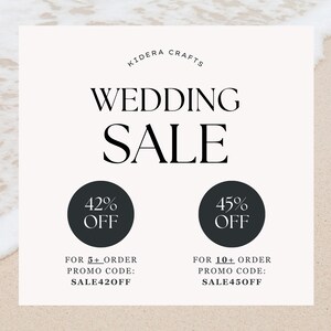 May include: A white card with black text announcing a wedding sale with discounts of 42% off for orders of 5 or more and 45% off for orders of 10 or more. The promo codes are SALE420FF and SALE450FF.