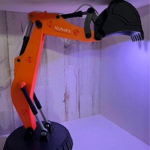 Excavator arm lamp with remote- Cat/Caterpiller, John Deere, Bobcat, Komatsu, & Kubota. 3D Print. Kubota