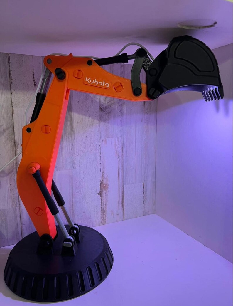 Excavator arm lamp with remote- Cat/Caterpiller, John Deere, Bobcat, Komatsu, & Kubota. 3D Print. Kubota