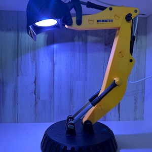 Excavator arm lamp with remote- Cat/Caterpiller, John Deere, Bobcat, Komatsu, & Kubota. 3D Print. Komatsu