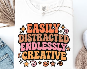 Easily Distracted Endlessly Creative PNG | Positive ADHD Awareness Graphic for Shirts, Stickers, & DIY Projects