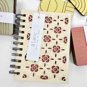 Small engraved wooden notebook or drawing pad with cherry tree motif, poplar wood