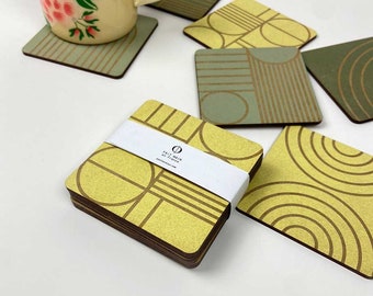 Set of six colorful engraved wooden coasters, geometric pattern and design, lemon