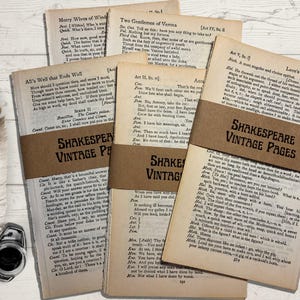 May include: A collection of vintage Shakespeare pages, bound with brown paper bands, featuring printed text. A white feather and inkwell are placed on the wooden surface, creating a literary theme.