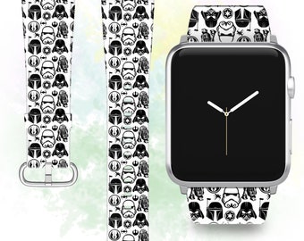 May include: A white Apple Watch band with a black and white Star Wars pattern featuring characters like Darth Vader, Stormtroopers, and Boba Fett. The band is compatible with Apple Watch Series 4 and later.